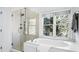 Bathroom with soaking tub and walk-in shower at 1048 Standard Ne Dr, Atlanta, GA 30319