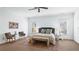 Bright bedroom with carpet, ceiling fan and two chairs at 1048 Standard Ne Dr, Atlanta, GA 30319