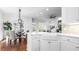 Bright kitchen with white cabinets and island at 1048 Standard Ne Dr, Atlanta, GA 30319