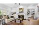 Spacious living room featuring a fireplace and built-in shelving at 1048 Standard Ne Dr, Atlanta, GA 30319