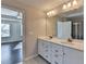 Double vanity and view of bedroom from bathroom at 2329 Village Grove Dr, Suwanee, GA 30024