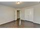 Bedroom with hardwood floors and double doors at 2329 Village Grove Dr, Suwanee, GA 30024