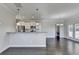 Modern kitchen with granite countertops and white cabinets at 2329 Village Grove Dr, Suwanee, GA 30024