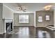 Living room with hardwood floors, fireplace and lots of natural light at 2329 Village Grove Dr, Suwanee, GA 30024