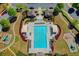 Resort-style pool with ample lounge chairs at 2329 Village Grove Dr, Suwanee, GA 30024