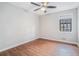 Spacious bedroom with hardwood floors and a ceiling fan at 2649 Porter Dr, Lawrenceville, GA 30044