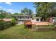 House exterior and deck, steps, and a large backyard at 2666 Frontier Trl, Atlanta, GA 30341