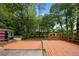 Large backyard with deck and lush trees at 2666 Frontier Trl, Atlanta, GA 30341