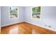 Bright bedroom with hardwood floors and two large windows at 2666 Frontier Trl, Atlanta, GA 30341