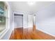 Spacious bedroom with hardwood floors, ample closet space, and light purple walls at 2666 Frontier Trl, Atlanta, GA 30341