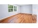 Living room with hardwood floors and light lavender walls at 2666 Frontier Trl, Atlanta, GA 30341