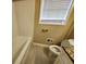 Clean bathroom with tub, toilet and granite countertop at 4427 Sun Valley Blvd, Atlanta, GA 30344