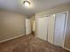 Bright bedroom featuring carpet and built in closet at 4427 Sun Valley Blvd, Atlanta, GA 30344