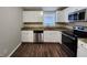 Kitchen boasts granite countertops and stainless steel appliances at 4427 Sun Valley Blvd, Atlanta, GA 30344