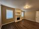 Living room with hardwood floors, fireplace, and large windows at 4427 Sun Valley Blvd, Atlanta, GA 30344