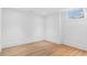 Bright and airy basement room with hardwood floors and a window at 464 Pine Tree Ne Dr, Atlanta, GA 30305