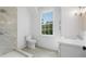 Bathroom boasts a shower, toilet and white vanity at 464 Pine Tree Ne Dr, Atlanta, GA 30305