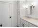 Modern bathroom with white cabinets, quartz countertops, and updated fixtures at 464 Pine Tree Ne Dr, Atlanta, GA 30305