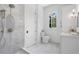 Spa-like bathroom with walk-in shower, toilet and vanity at 464 Pine Tree Ne Dr, Atlanta, GA 30305