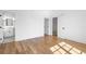 Bedroom with hardwood floors and access to a full bathroom at 464 Pine Tree Ne Dr, Atlanta, GA 30305