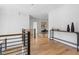 Bright and airy upstairs hallway with hardwood floors at 464 Pine Tree Ne Dr, Atlanta, GA 30305