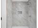 Bathroom with a large walk-in shower and gray marble tile at 464 Pine Tree Ne Dr, Atlanta, GA 30305