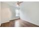 Bright bedroom with hardwood floors and a ceiling fan at 199 14Th St # 409, Atlanta, GA 30309