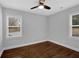 Well lit bedroom with hardwood floors and ceiling fan at 274 Memorial Se Ter, Atlanta, GA 30316