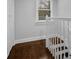 Elegant staircase with dark wood and white railings at 274 Memorial Se Ter, Atlanta, GA 30316