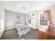 Charming bedroom with beach mural and twin bed at 4450 Fairfax Dr, Cumming, GA 30028