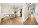 Dining room with hardwood floors and farmhouse style table and chairs at 4450 Fairfax Dr, Cumming, GA 30028