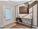 Inviting entryway featuring stylish wall decor, console table and sleek, wood-look floors at 532 Barlow Pl, Grayson, GA 30017