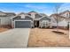 Charming one-story home featuring well-manicured front yard and attached two-car garage at 532 Barlow Pl, Grayson, GA 30017