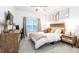 Spacious bedroom with wood bed frame and neutral decor at 955 Juniper St Ne # 4022, Atlanta, GA 30309