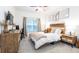 Spacious bedroom with wood-toned headboard and neutral decor at 955 Juniper Ne St # 4022, Atlanta, GA 30309