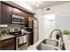 Modern kitchen with stainless steel appliances at 955 Juniper St Ne # 4022, Atlanta, GA 30309