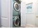 Convenient laundry room with stacked washer and dryer at 955 Juniper St Ne # 4022, Atlanta, GA 30309