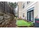 Private patio with artificial turf and small table at 955 Juniper St Ne # 4022, Atlanta, GA 30309