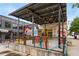 Outdoor patio seating with colorful stools and string lights at 105 Georgia Se Ave # 3, Atlanta, GA 30312