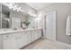 Elegant bathroom with double vanity and stylish white cabinets at 132 Marietta Walk Trce, Marietta, GA 30064