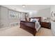 Charming bedroom with built-in shelving and hardwood floors at 132 Marietta Walk Trce, Marietta, GA 30064