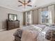 Bright bedroom featuring a comfortable bed and ample natural light at 132 Marietta Walk Trce, Marietta, GA 30064