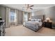 Spacious bedroom with large windows and plush carpeting at 132 Marietta Walk Trce, Marietta, GA 30064