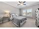 Cozy bedroom with a ceiling fan and plenty of natural light at 132 Marietta Walk Trce, Marietta, GA 30064