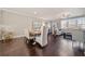 Bright dining room with hardwood floors and farmhouse table at 132 Marietta Walk Trce, Marietta, GA 30064