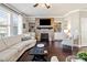 Gathering room featuring fireplace and hardwood floors at 132 Marietta Walk Trce, Marietta, GA 30064