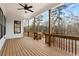 Large wooden deck overlooking a wooded backyard at 208 Pindos Sw Pl, Powder Springs, GA 30127