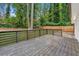 Modern back deck with wood-look planks and a view of the backyard at 2212 Glendale Dr, Decatur, GA 30032