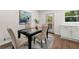 Kitchen dining area with glass table and modern chairs at 2212 Glendale Dr, Decatur, GA 30032