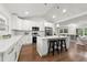 Newly renovated kitchen with white cabinetry, island, and vaulted ceiling at 2212 Glendale Dr, Decatur, GA 30032